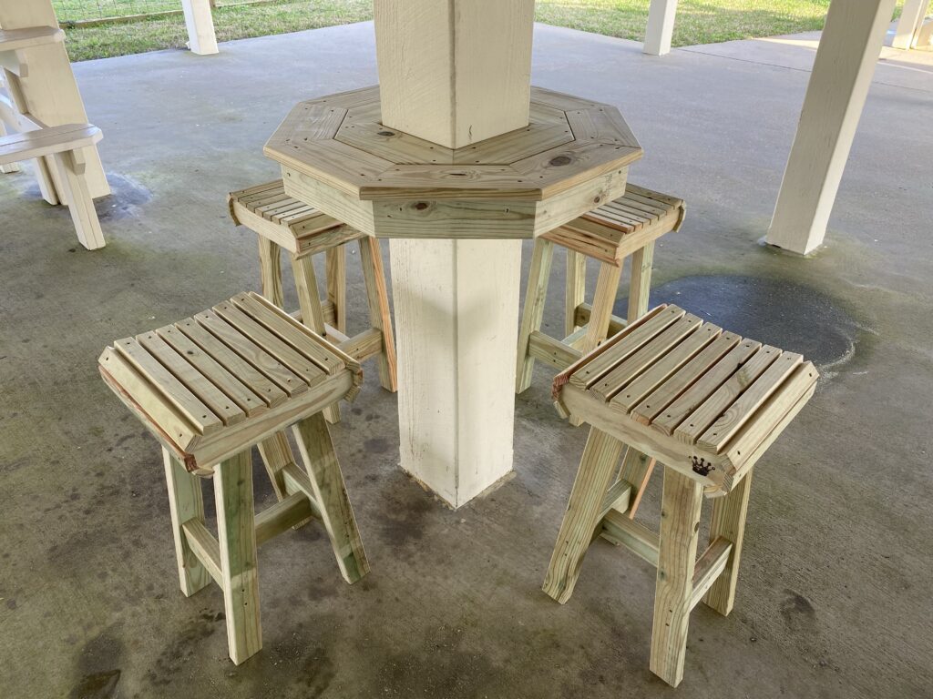 piling table with four barstools